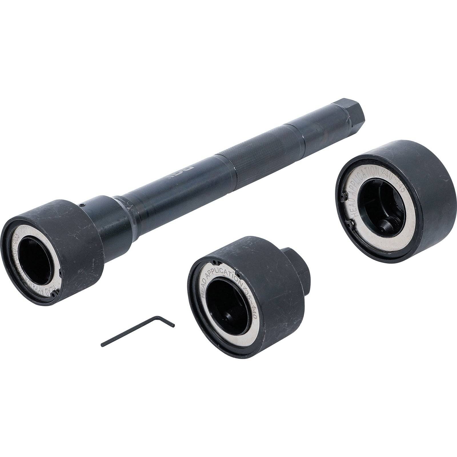 Schwarze Gewindestange mit zylindrischen Verbindern, abnehmbaren Enden und einem kleinen Sechskantschlüssel, die zum sicheren Verbinden von Rohren oder Anschlüssen verwendet wird.