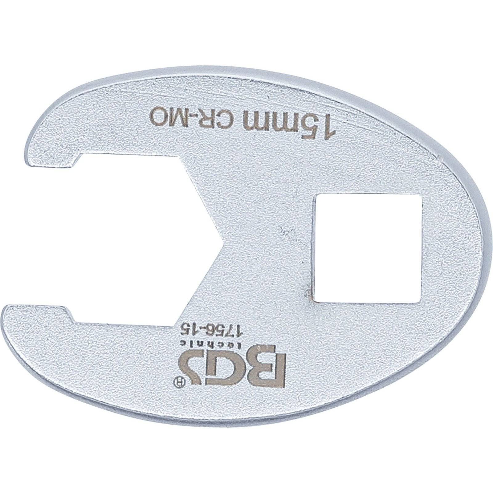 Ein Schraubenschlüssel-Kopf aus Metall mit der Markierung '15mm CR-MO' in Ausführung mit offener Gabel und quadratischer Aufnahme, verwendet für mechanische und automotive Arbeiten.