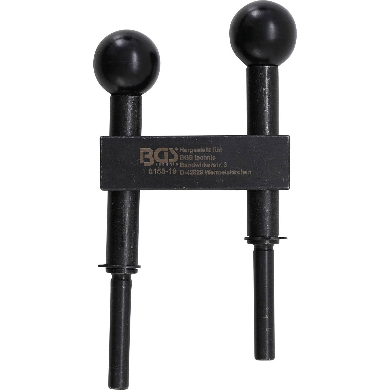 Ein Metallwerkzeug mit zwei schwarzen runden Griffen und zwei nach unten ragenden Stäben, das für spezifische mechanische Anwendungen oder Einstellungen verwendet wird.