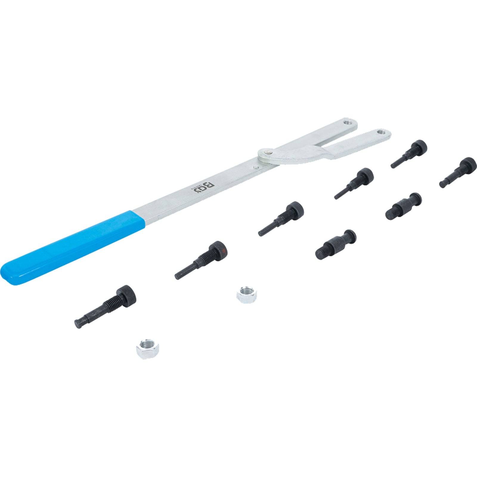 „Ein Werkzeug mit blauem Griff und Einstellkopf, umgeben von schwarzen Schrauben und Muttern, wahrscheinlich für Reparaturen oder Einstellungen verwendet.