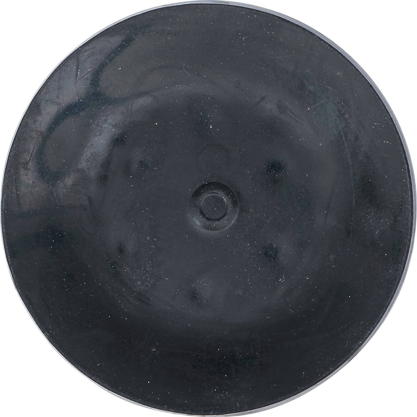 Eine schwarze Vinylschallplatte mit reflektierender Oberfläche. Einige blasse Kratzer und Spuren sind sichtbar. Das zentrale Etikett ist nicht zu erkennen.