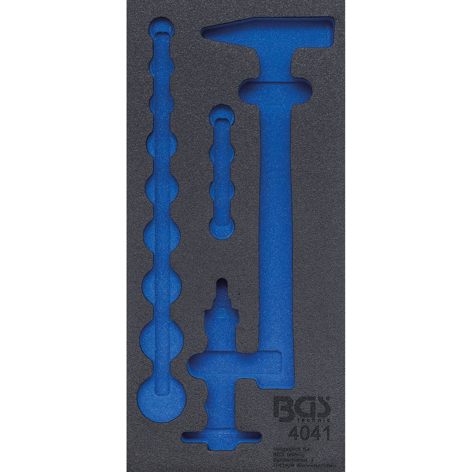Blaues Schaumstoffpanel mit blauen Werkzeugen, die präzise in Form geschnitten sind: ein Hammer, eine Stemmeisen und kleine Werkzeuge; am unteren Rand mit 'BGS 4041' beschriftet.