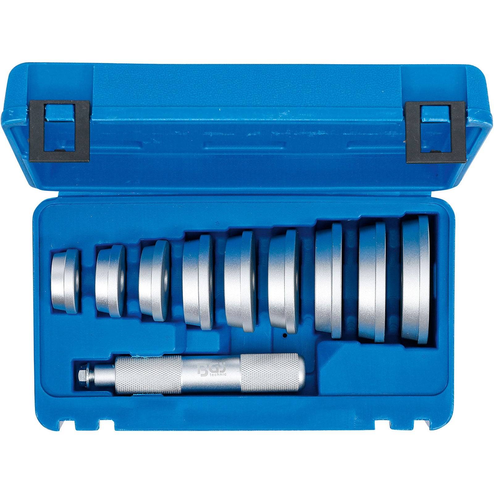 Eine blaue Plastikbox, die einen Satz von acht metallenen Lochbohrern in aufsteigender Größenordnung enthält, mit einem Handwerkzeug am unteren Ende.