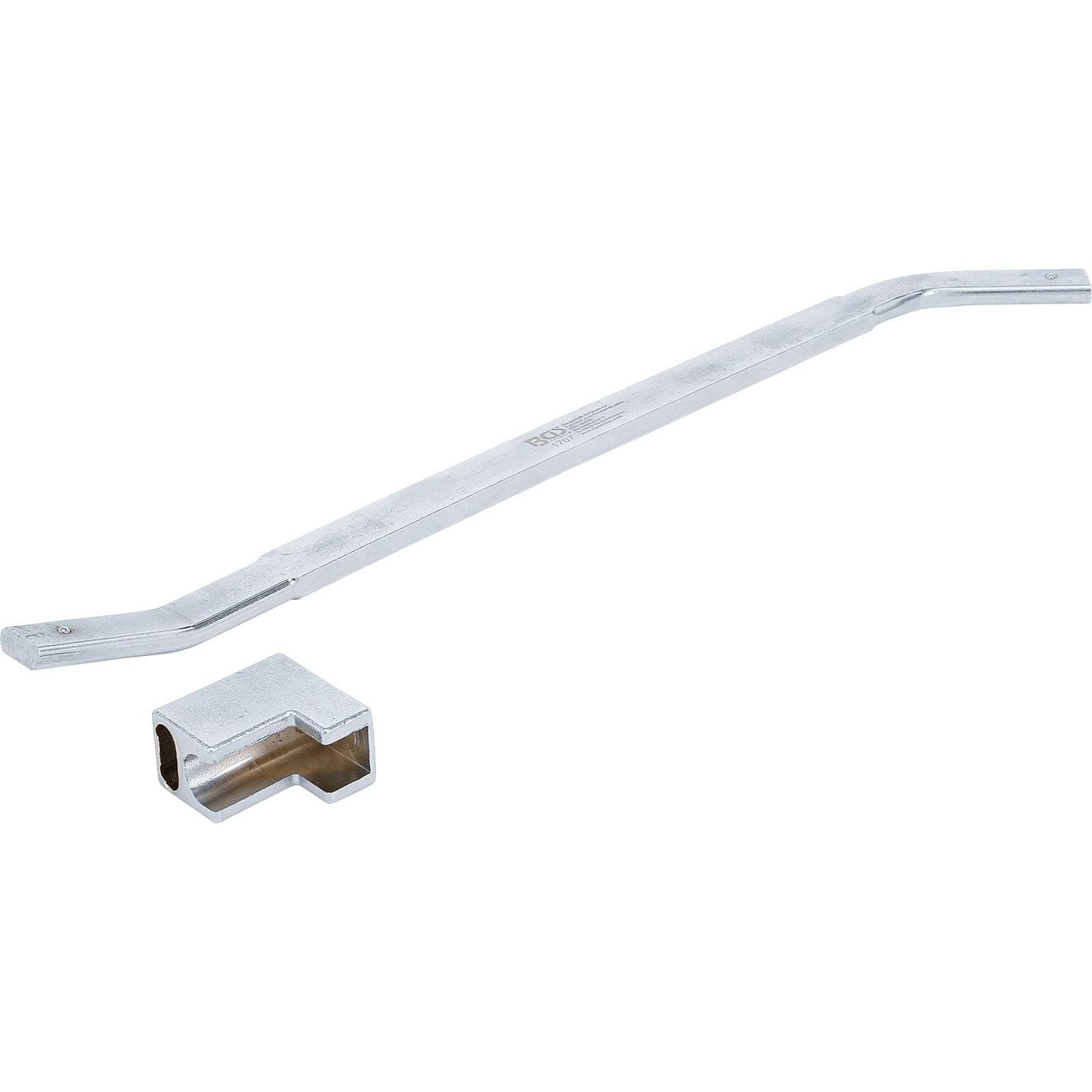 Eine silberne, L-förmige Verbindungsschiene neben ihrem rechteckigen Metallschlüssel, die zum Sichern von Gegenständen verwendet wird.