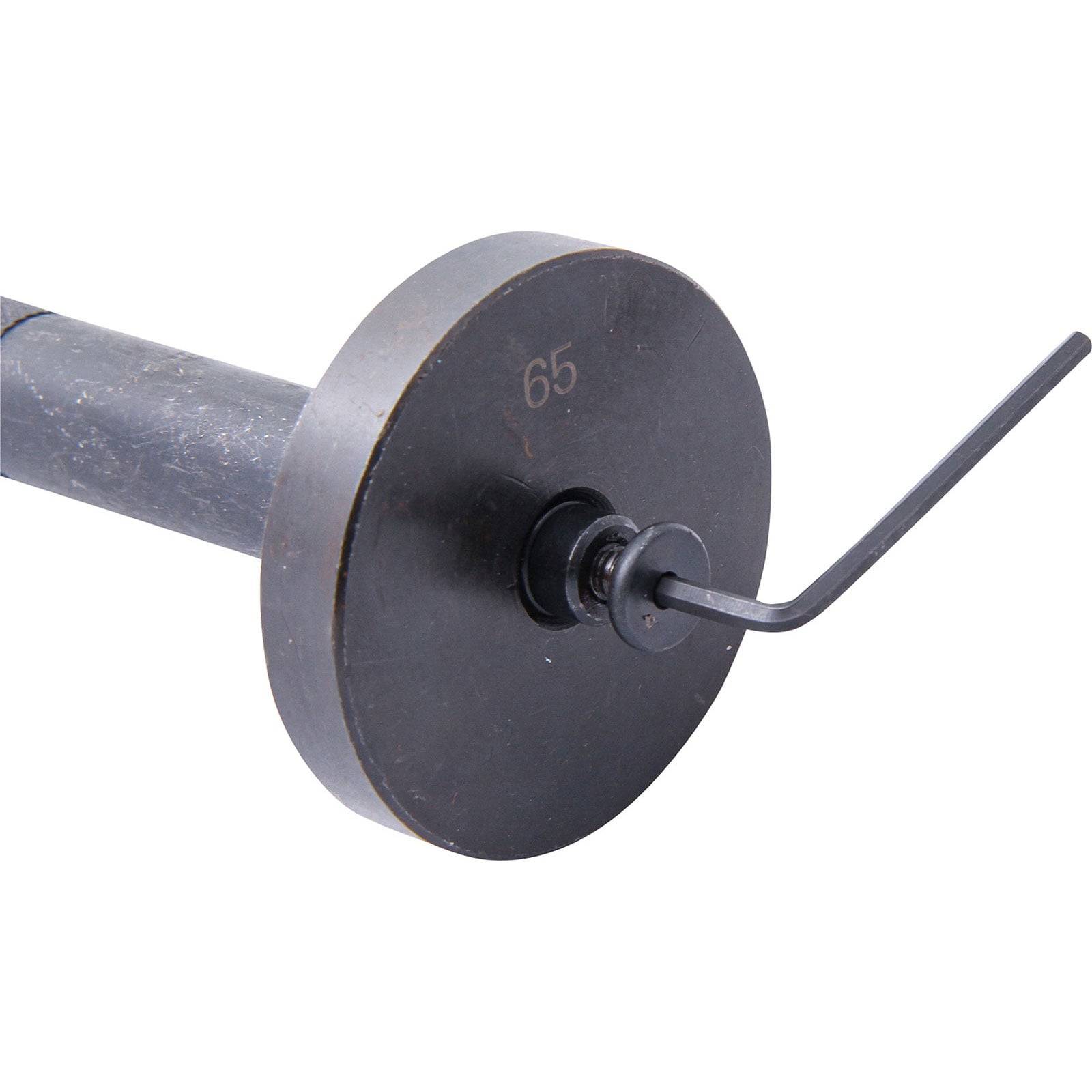 Eine graue und schwarze Langhantel zum Gewichtheben mit sichtbarer '65' Markierung auf der Gewichtsscheibe und einem angebrachten Inbusschlüssel.