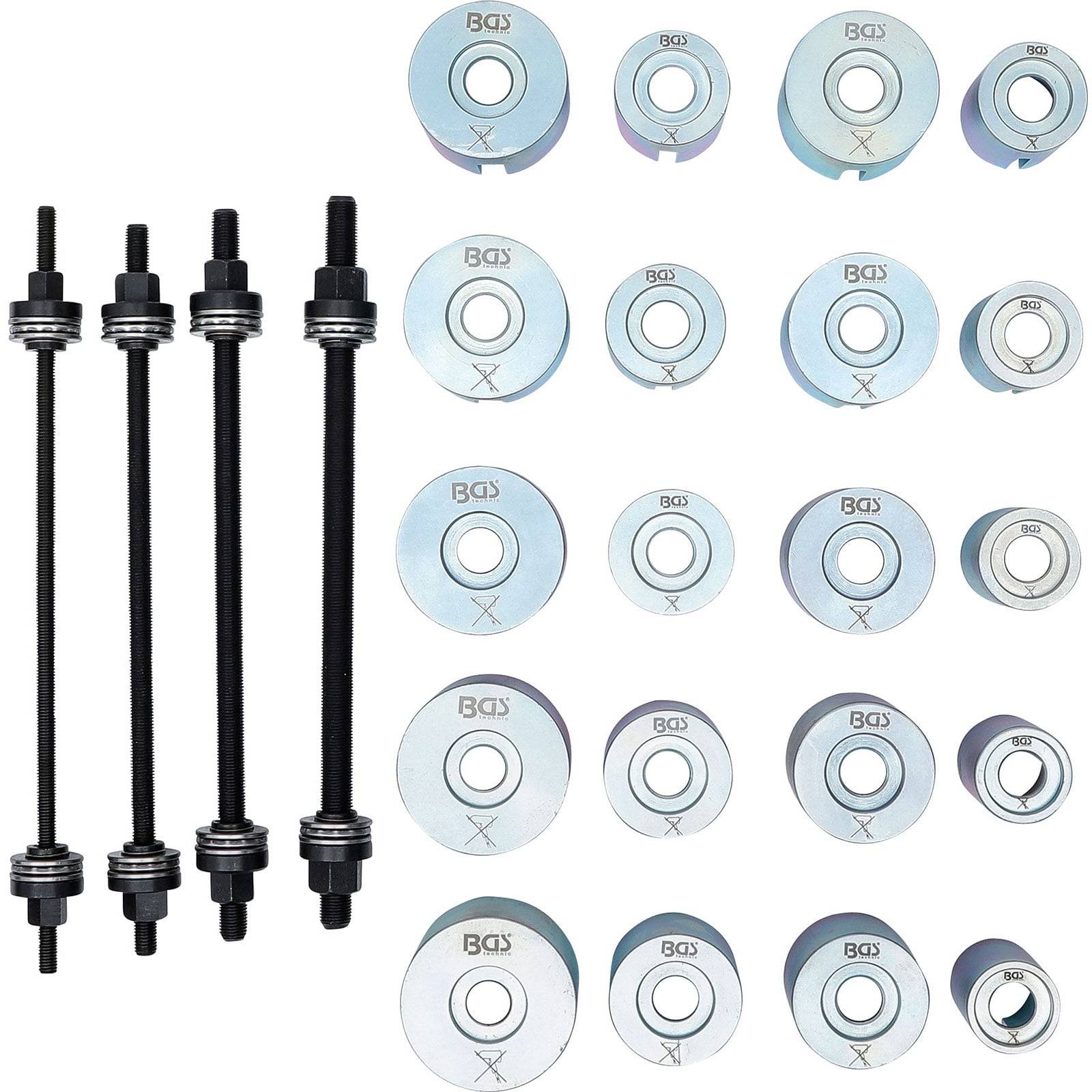 Ein Set von Autoreperaturwerkzeugen, bestehend aus vier schwarzen Stäben mit Gewindeenden und sechzehn silbernen kreisförmigen Komponenten unterschiedlicher Größen, die für die Fahrzeugwartung verwendet werden.