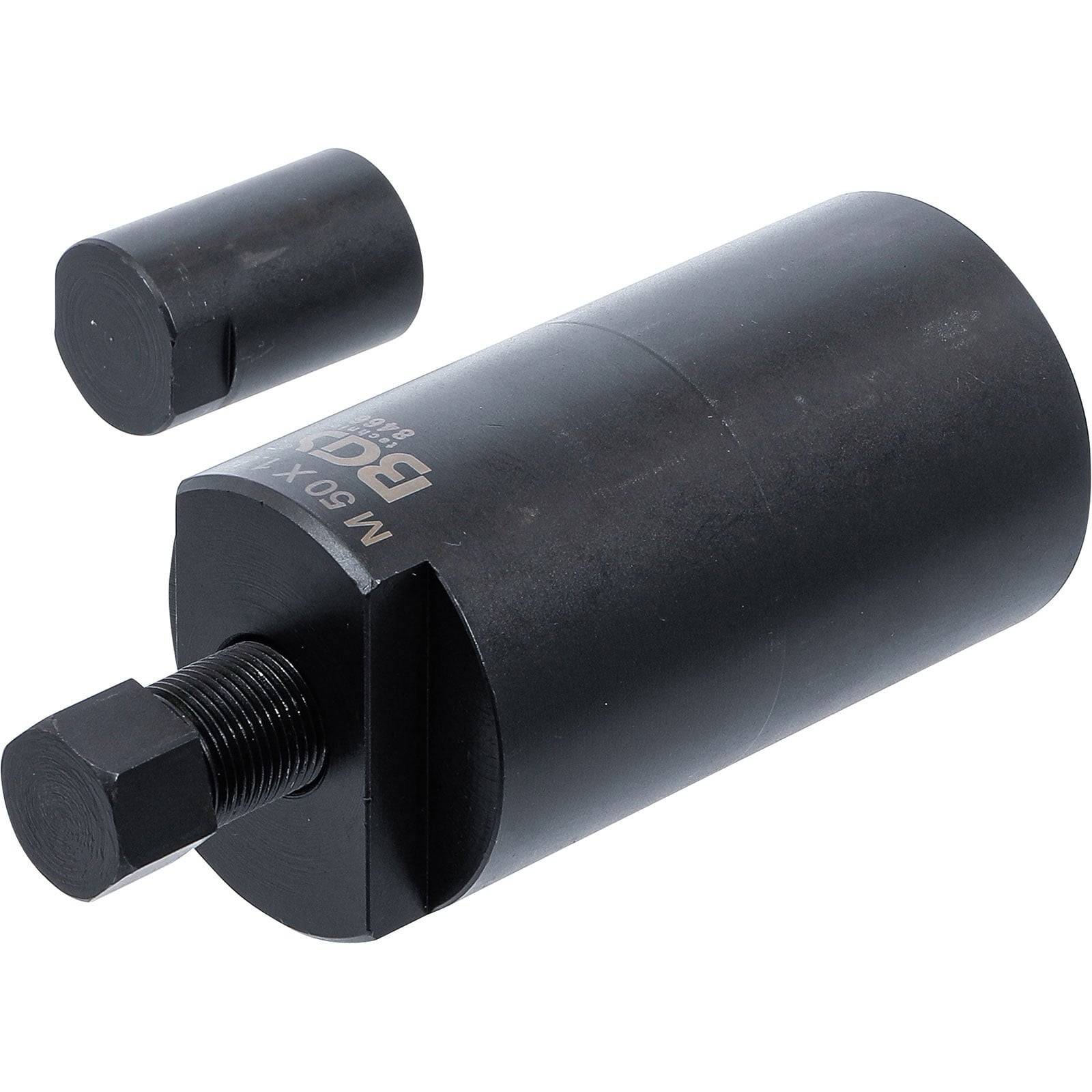 Ein schwarzes zylindrisches Werkzeug mit einer angeschlossenen Schraube und einem kleineren separaten zylindrischen Teil, der für mechanische Anpassungen verwendet wird.