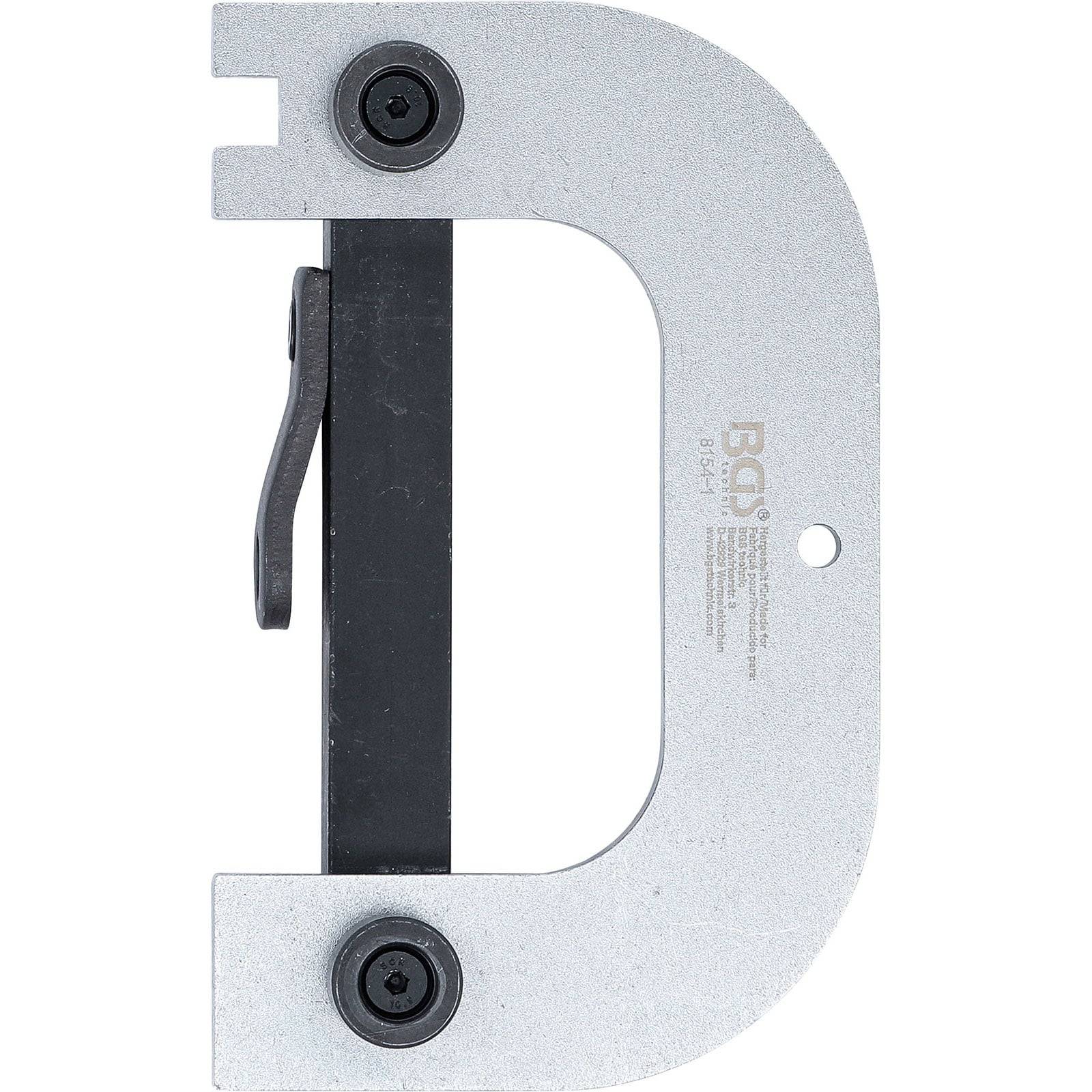 Eine Metall-C-Klemmzange mit schwarzen rotierenden Schrauben und einer texturierten Oberfläche, die zum sicheren Zusammenhalten von Objekten verwendet wird.