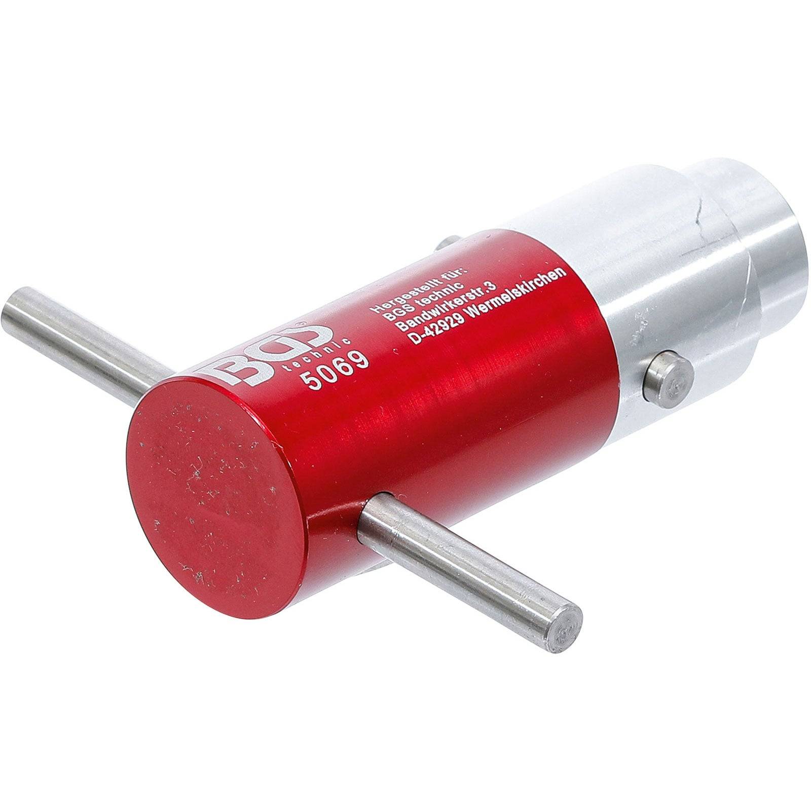 Ein roter und silberner zylindrischer Werkzeug mit zwei horizontalen Metallstangen, die an den Seiten herausragen. Es hat weiße Schrift, die 