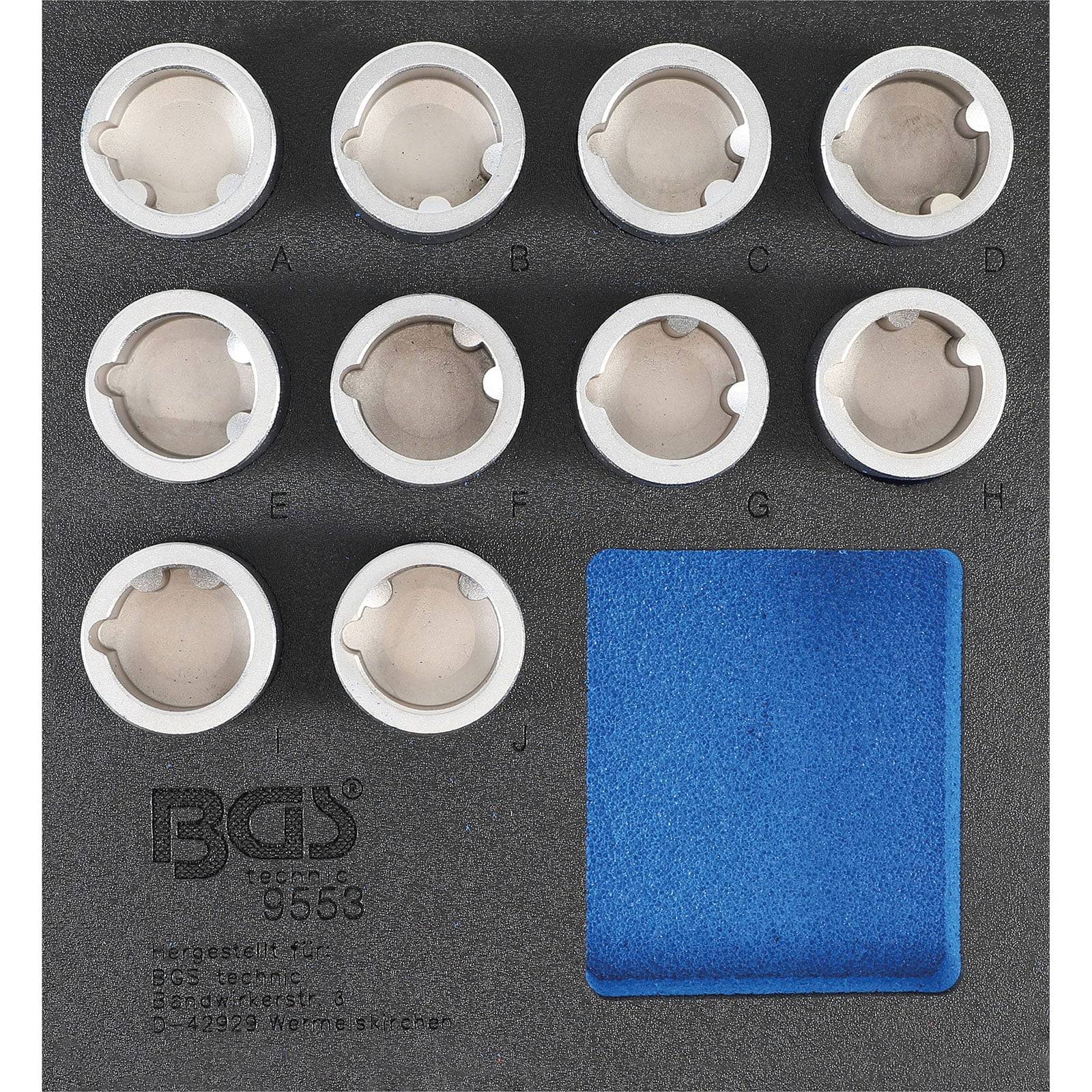 BCS 9563 Zündkerzeneinsatz-Set mit zehn beschrifteten Schlitzen (A-J) neben einem blauen Schaumstofffach, entwickelt für organisierte Aufbewahrung und Verwendung.