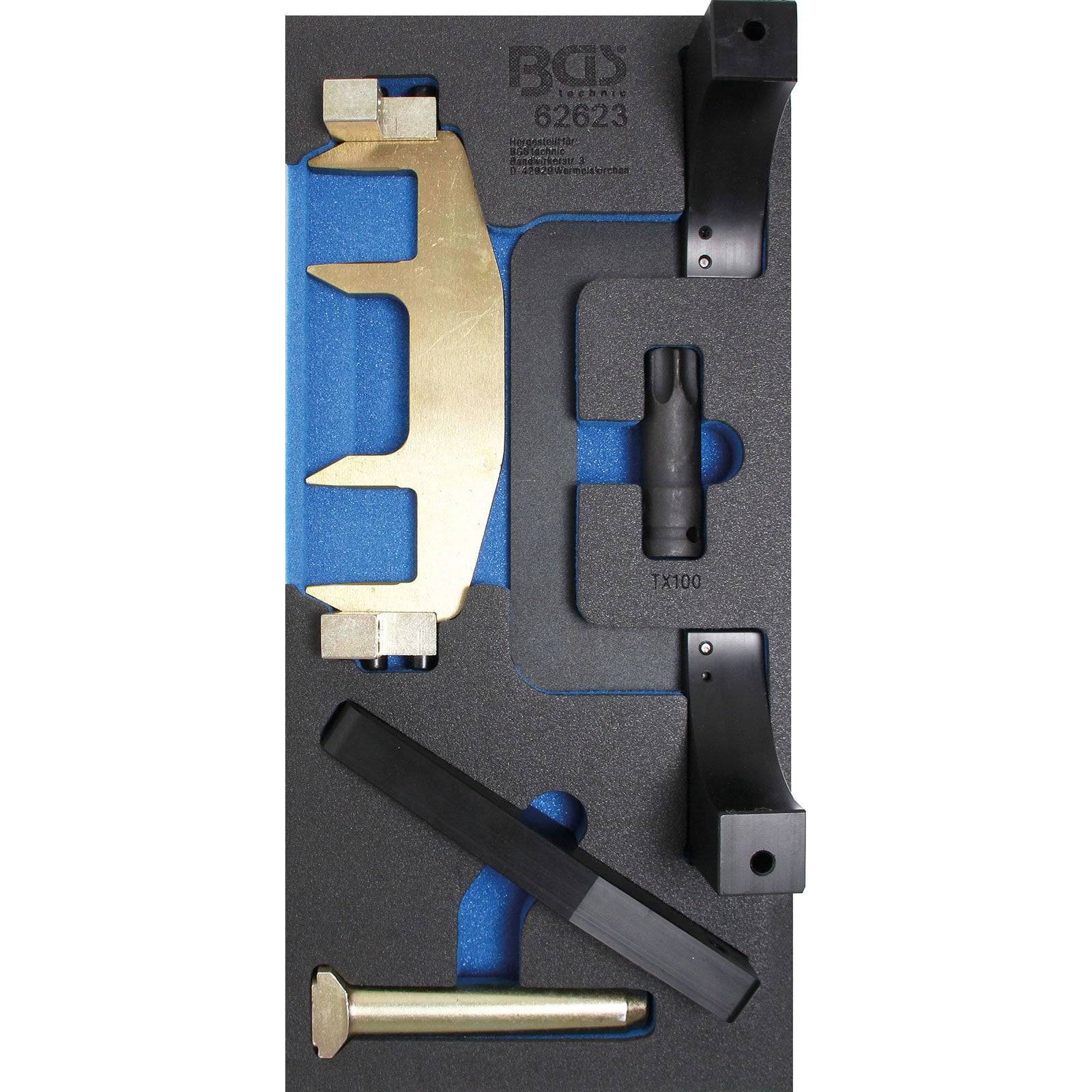 Werkzeugsatz in einem Schaumstoffkoffer mit goldfarbener Halterung, schwarzen Teilen und einem Bolzen, entwickelt für Motorsteuerungsjustierungen, gekennzeichnet als 'BGS 62623'.