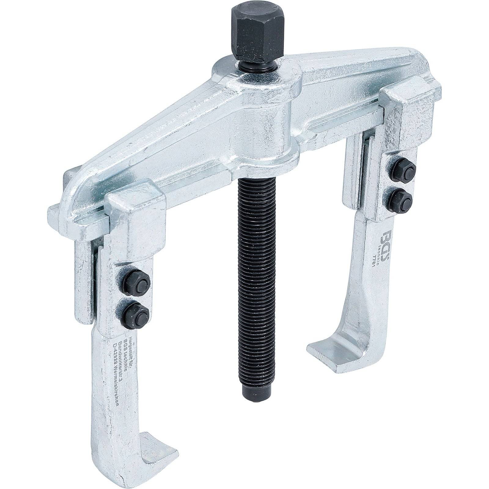 Ein Metallgetriebe-Abzieher mit zwei Backen und einer zentralen Schraube, der zum Entfernen von Zahnrädern von Wellen in mechanischen Geräten verwendet wird.