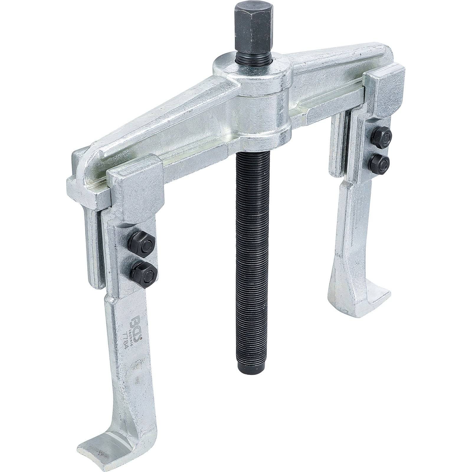 Ein Metallgetriebe-Abzieher mit drei verstellbaren Armen und einem zentralen Schraubenmechanismus zum Abnehmen von Zahnrädern oder Riemenscheiben von Wellen.