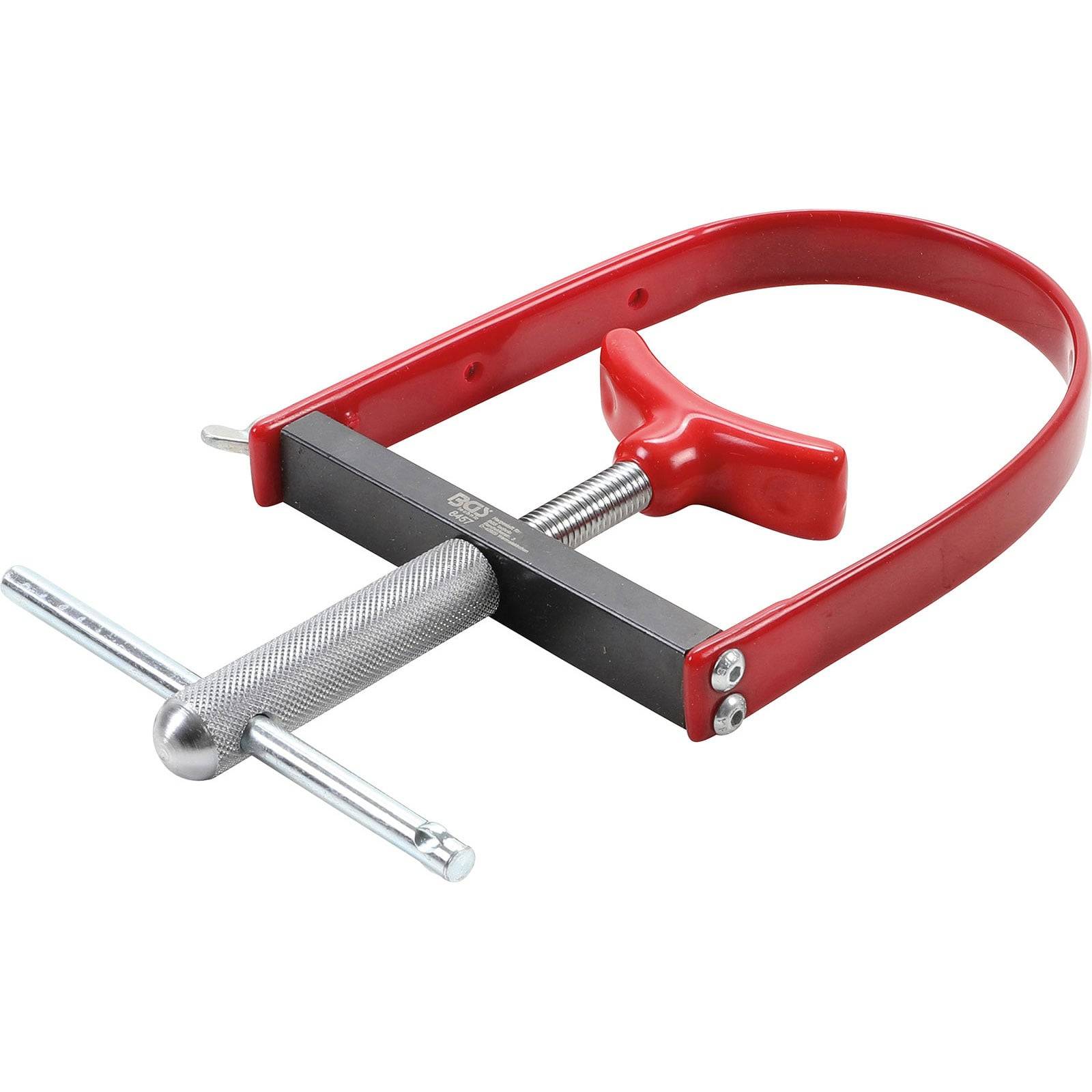 Ein roter U-förmiger Ventilfedern-Kompressor mit silbernem Griff und schwarzer Halterung.