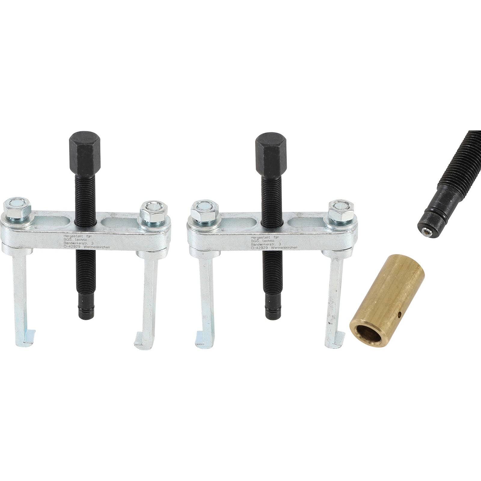 Ein Bremstrommel-Servicetools-Satz, bestehend aus zwei Abzieher, einer Hülse und einer Gewindestange, verwendet zum Aus- und Einbau von Trommelbremsen.