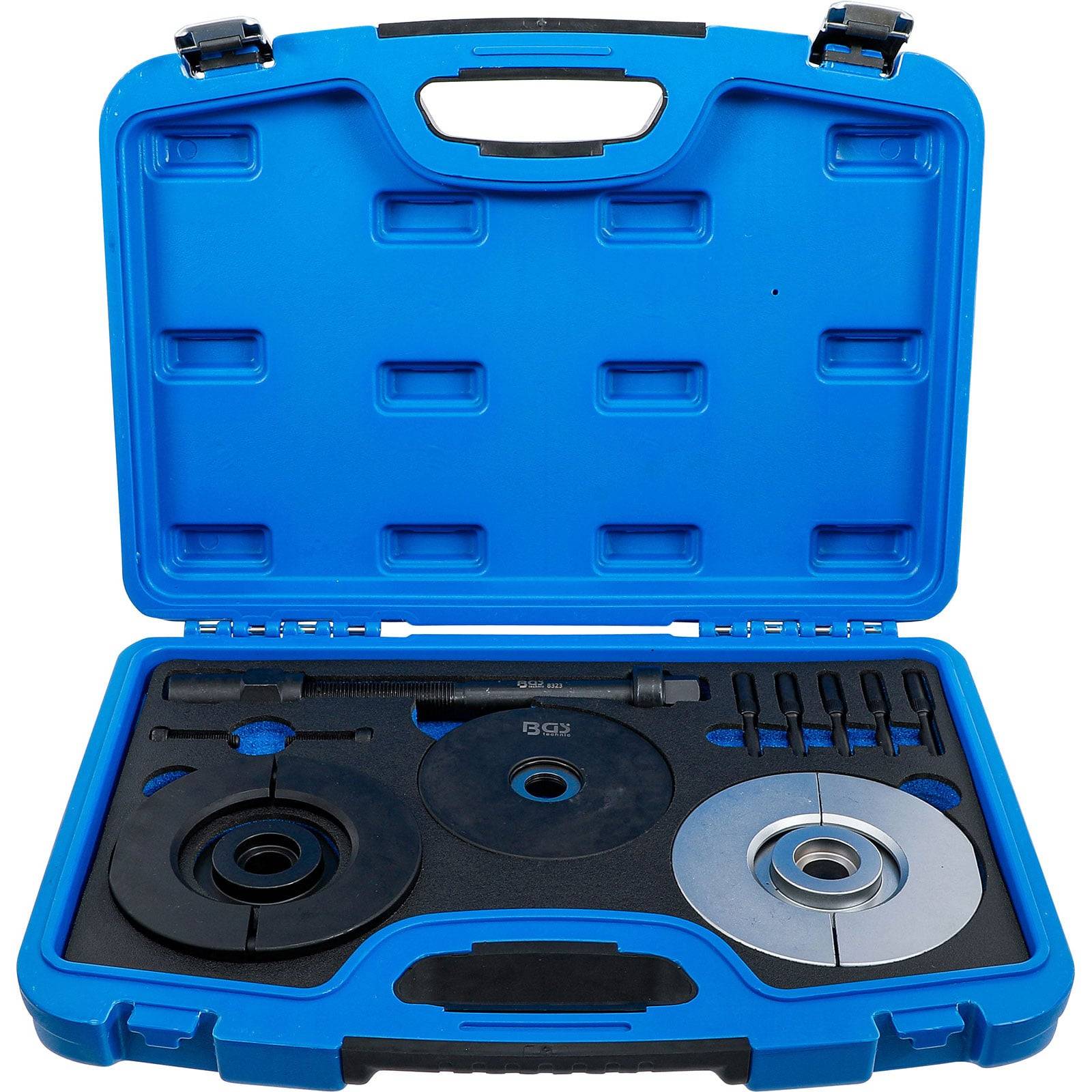 Eine blaue Plastiktragetasche, die verschiedene kreisförmige Metallteile und Werkzeuge enthält, die ordentlich und sorgfältig angeordnet sind, höchstwahrscheinlich für mechanische Zwecke.