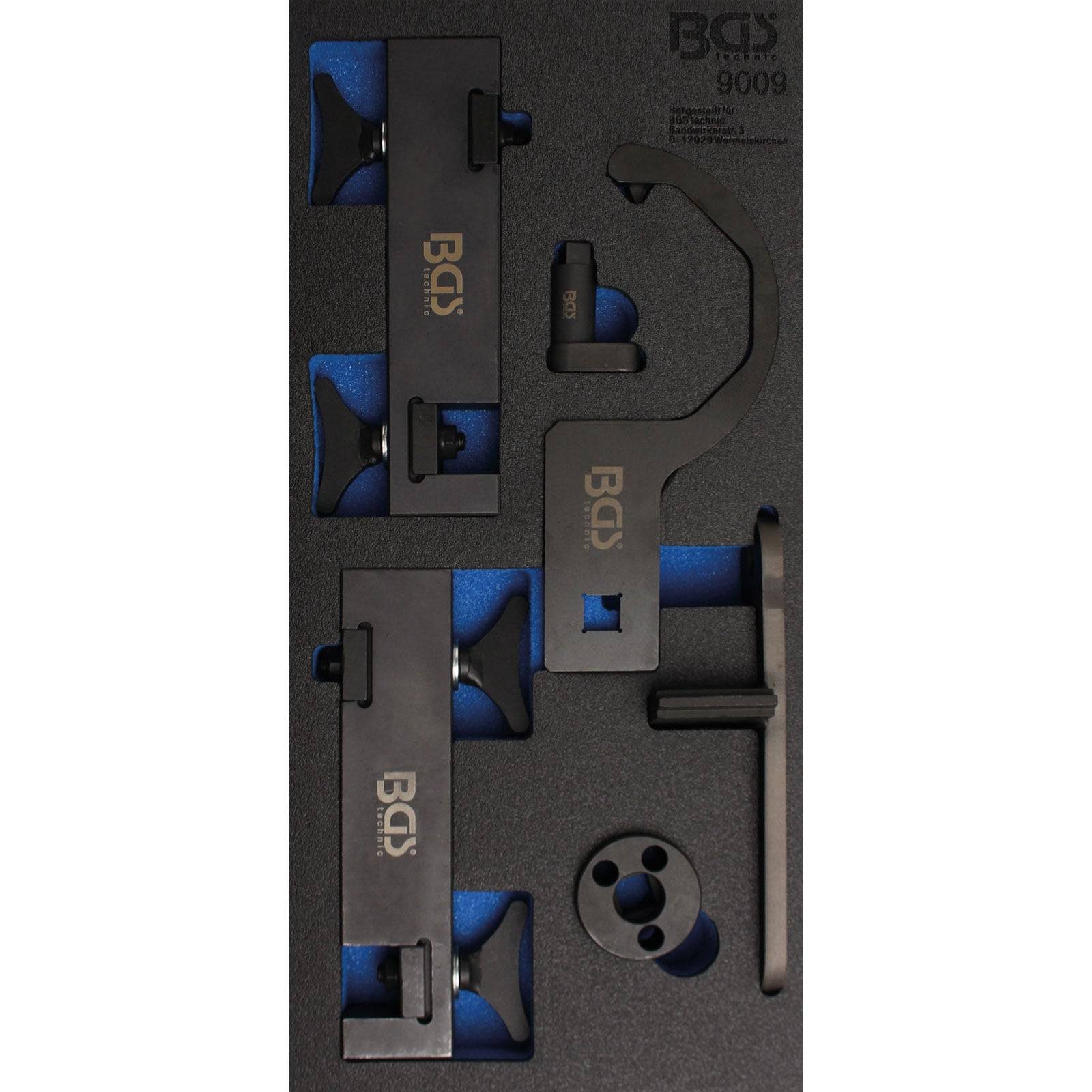 EINSTELLWERKZEUG-SATZ 1.2 THP-MINI-PEUGEOT-FORD-VOLVO-CITROEN 10-.' Schwarzer Metall-Automotiv-Einstellwerkzeugsatz mit verschiedenen Komponenten in Schaumstoff.