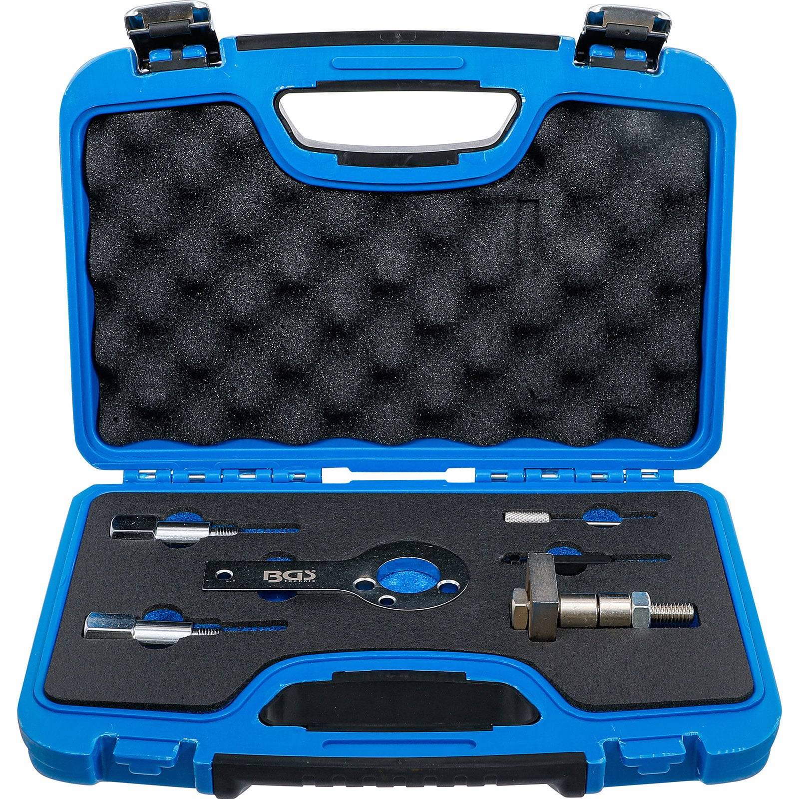 Eine blaue Plastikbox mit verschiedenen Metallwerkzeugen, darunter ein kreisförmiges Stück und mehrere kleine verstellbare Komponenten, eingebettet in Schaumstoffpolsterung.