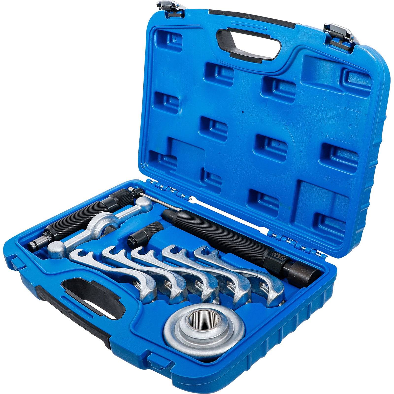 Eine blaue Plastikbox öffnet sich und gibt einen Satz verschiedener Kfz-Werkzeuge frei, darunter Schraubenschlüssel und Abzieher, die in vorgesehenen Fächern sorgsam angeordnet sind.