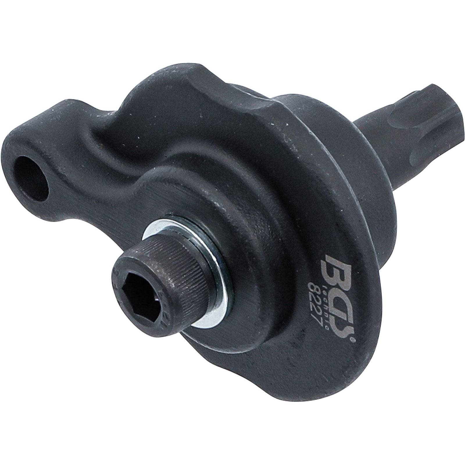 Ein Metallautoteil mit einer runden Scheibe und einer vorstehenden Welle, das die Markeninitialen 