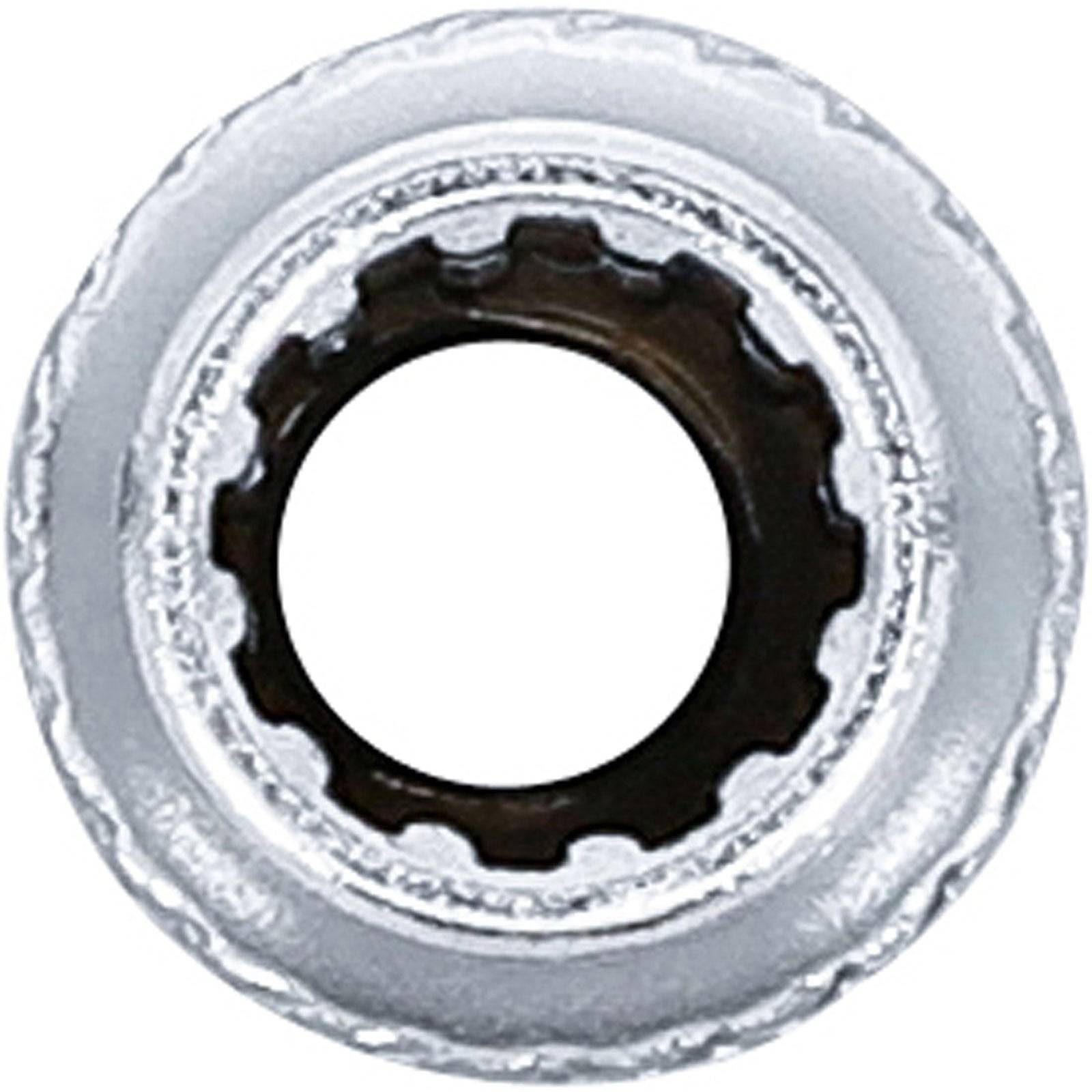 Ein metallisches, strukturiertes Zahnrad mit einem gerillten Mittenmuster.