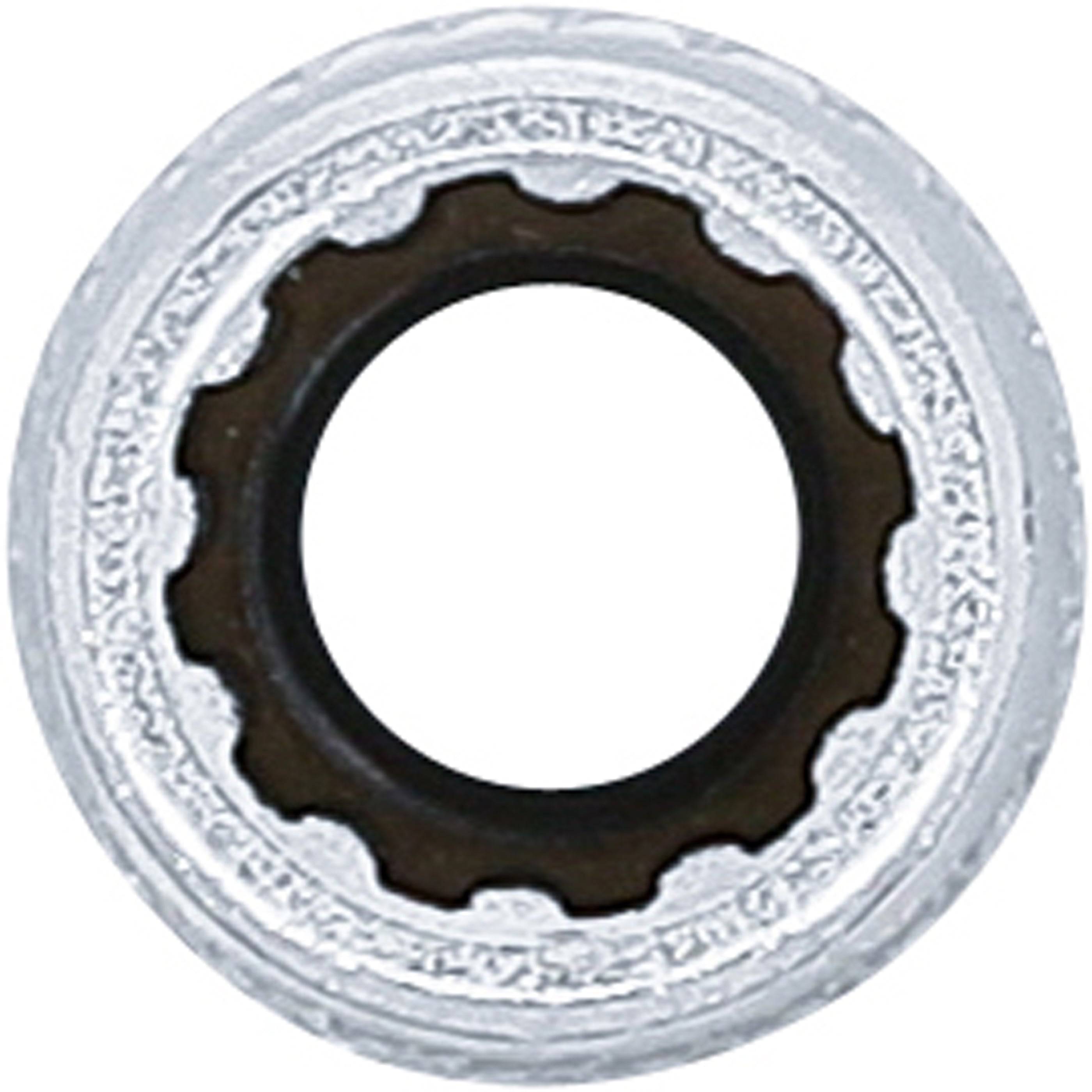 Eine Nahaufnahme eines kreisförmigen mechanischen Bauteils mit einem zentralen Loch und einer zahnradähnlichen Kante, möglicherweise ein Lager oder Zahnrad, das eine metallische Textur zeigt.