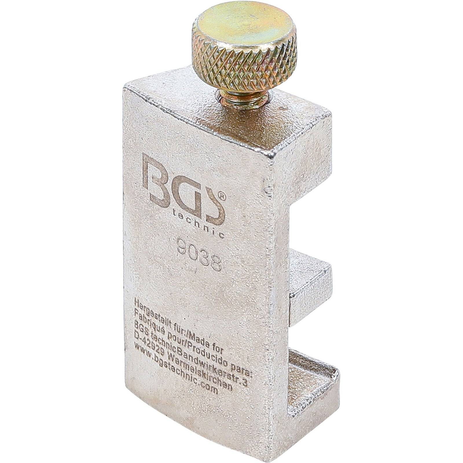 Ein Metallwerkzeug mit der Bezeichnung 'BGS technic 9088', versehen mit einer verstellbaren Schraube an der Oberseite, das zum sicheren Festhalten oder Ausrichten von Objekten dient.