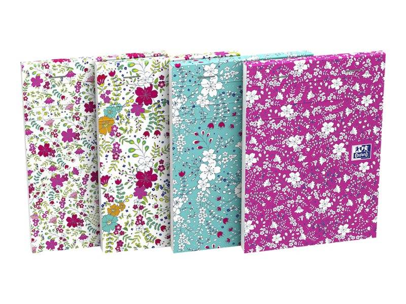 Vier floralmusterierte Notizbücher oder Journale aufrecht stehend, in weiß, mehrfarbigen, blaugrünen und magentafarbenen Designs.