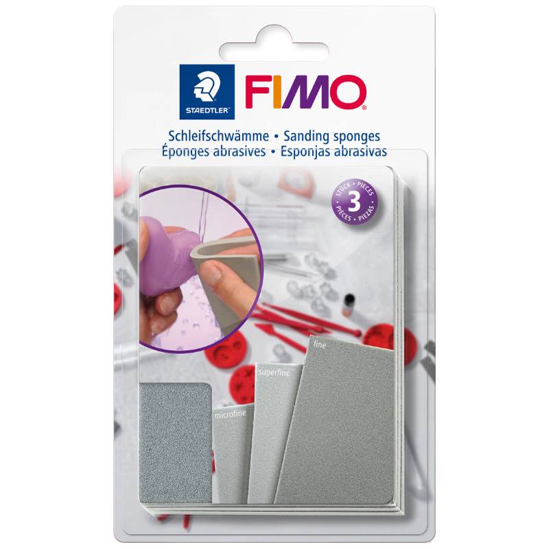 Verpackung für FIMO-Schleiferschwämme von Staedtler mit drei grauen Schleifpads und einem kleinen Foto einer Hand, die ein violettes Objekt abschlift.