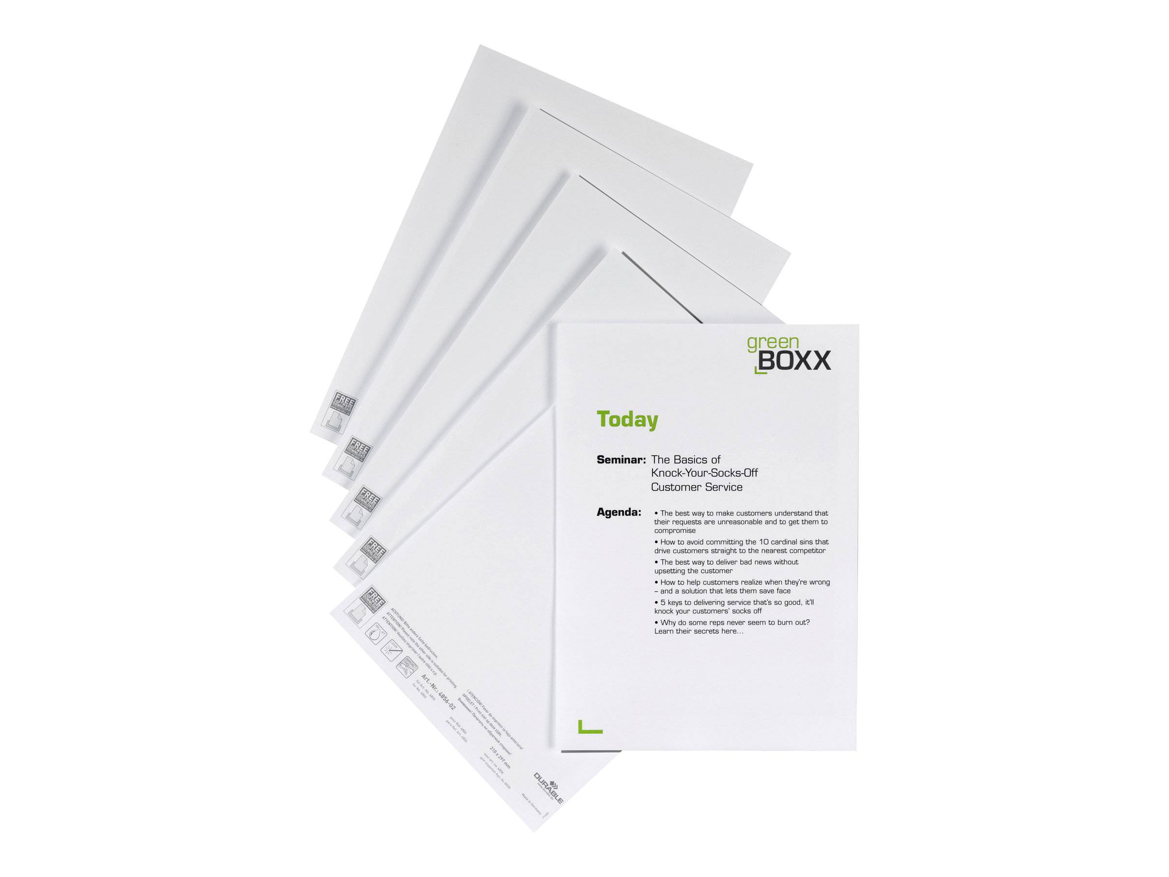 Stapel von greenBOXX Seminar-Unterlagen oder Broschüren, fächerförmig auf weißem Hintergrund angeordnet, mit einer Titelseite mit der Überschrift „Heute