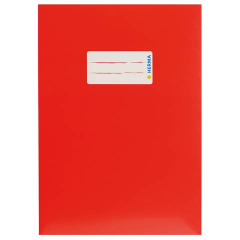 Helles rotes Buch oder Notizbucheinband mit einem kleinen weißen Etikett oben in der Nähe, auf dem 
