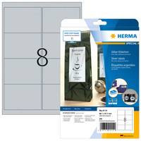 Paket mit HERMA weißen Adressetiketten, Größe 210 x 297 mm, 8 Etiketten pro Blatt, gezeigt mit einer Etikettenbogen-Vorlage und Produktverpackung.