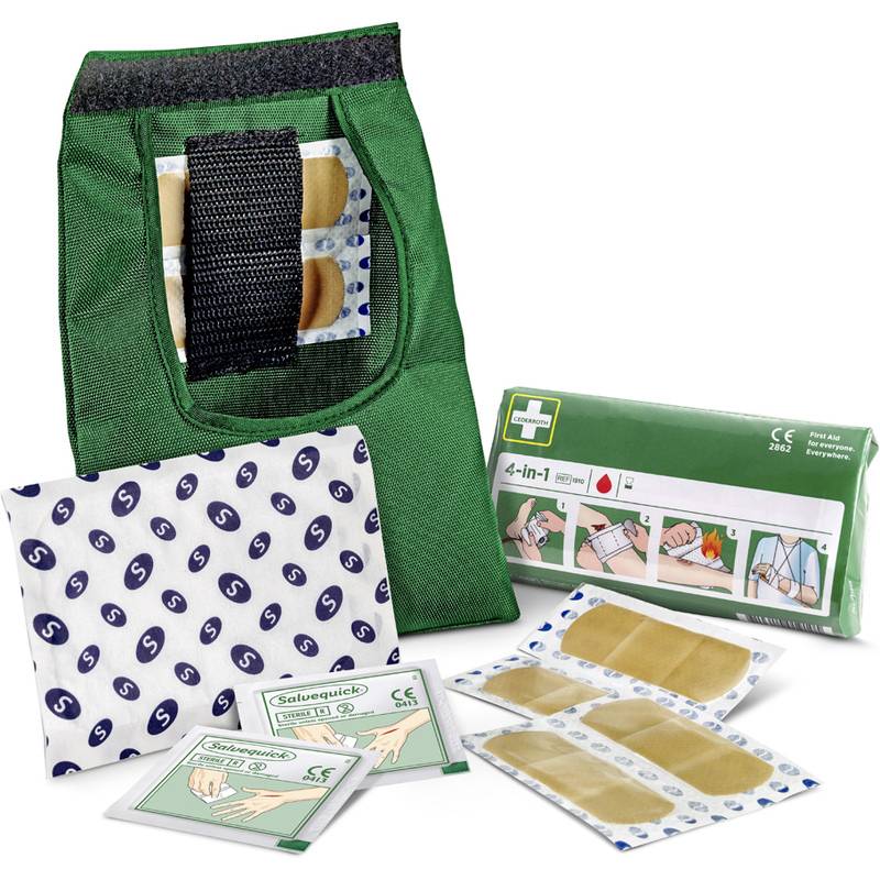 Erste-Hilfe-Set mit verschiedenen Pflastern, einschließlich einer grünen Tasche, einer Schachtel mit der Aufschrift „4-in-1