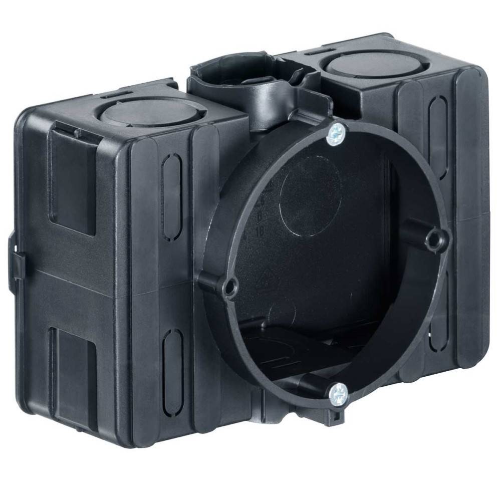 Eine schwarze, kreisförmige elektrische Verteilerdose mit drei Öffnungen wird gezeigt, die üblicherweise zur Aufnahme von elektrischen Leitungsverbindungen in Gebäudewänden verwendet wird.