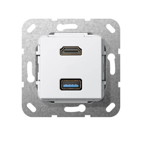 Wandmontierte Steckdose mit HDMI- und USB-Anschlüssen, gerahmt auf einer metallischen Trägerplatte.