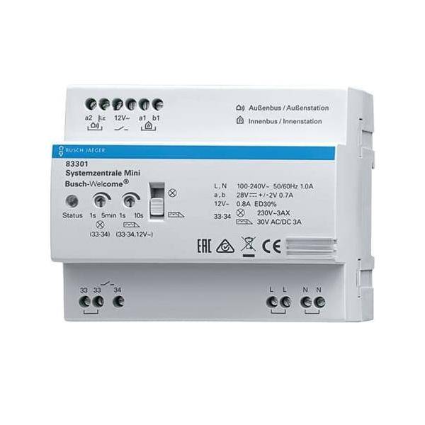 Ein weißes elektronisches Gerät mit der Beschriftung 'Systemzentrale Mini Busch-Welcome' mit Eingabe-/Ausgabesspezifikationen und verschiedenen Anschlussports.