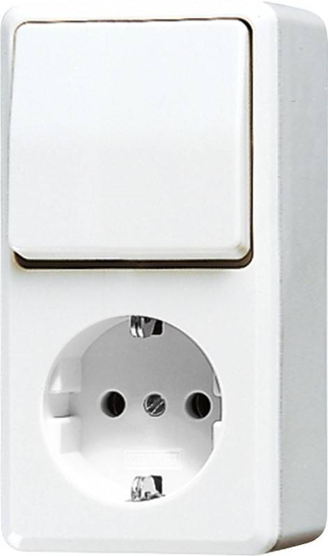 Eine weiße Steckdose und ein Schalter an einer Wand, die eine europäische Steckdose und einen rechteckigen Schalter darüber zeigen.