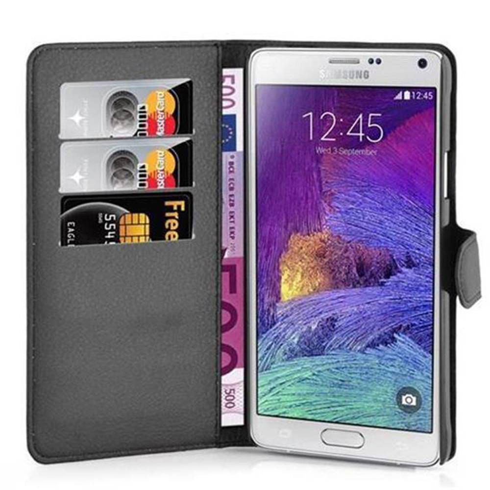 Cadorabo Hülle für Samsung Galaxy NOTE 4 Schutz Hülle in Schwarz Handyhülle Etui Case Cover Magnetverschluss