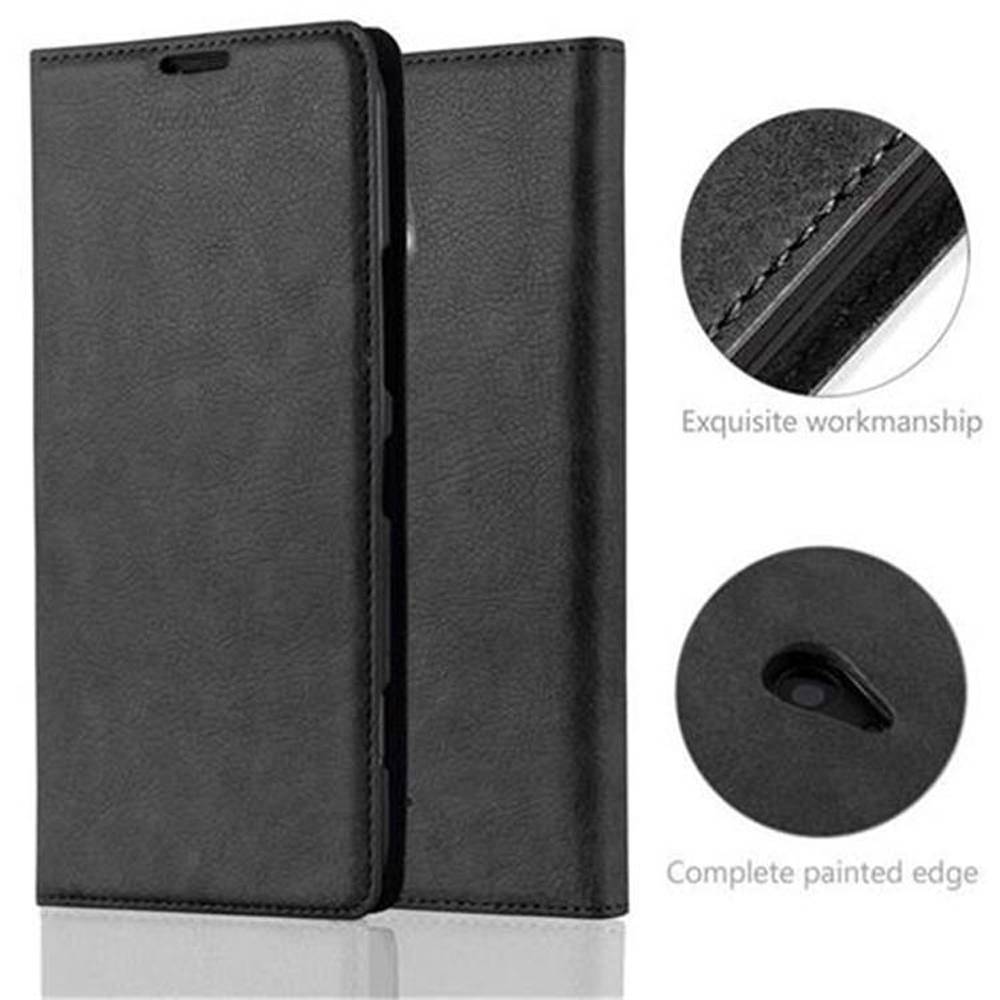Cadorabo Hülle für Nokia Lumia 1320 Schutz Hülle in Schwarz Handyhülle Etui Case Cover Magnetverschluss