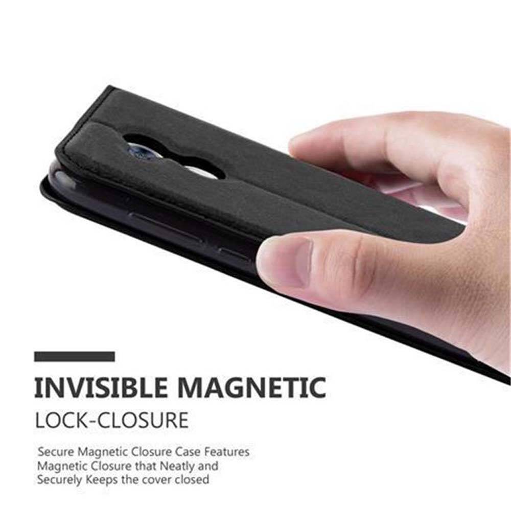 Cadorabo Hülle für Honor 6A Schutz Hülle in Schwarz Handyhülle Etui Case Cover Magnetverschluss