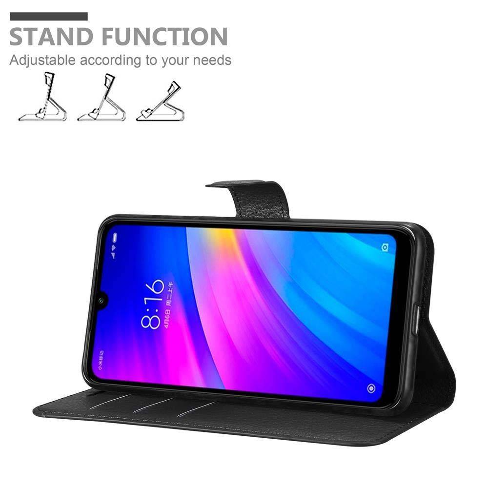 Cadorabo Hülle für Xiaomi RedMi 7 Schutz Hülle in Schwarz Handyhülle Etui Case Cover Magnetverschluss