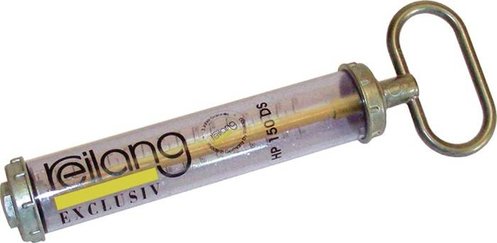 Ein transparenter zylindrischer Handgriff oder Trainingsgerät mit einem Metallschlaufengriff, auf dem Rohr mit 'reilang' und 'EXCLUSIV' beschriftet.