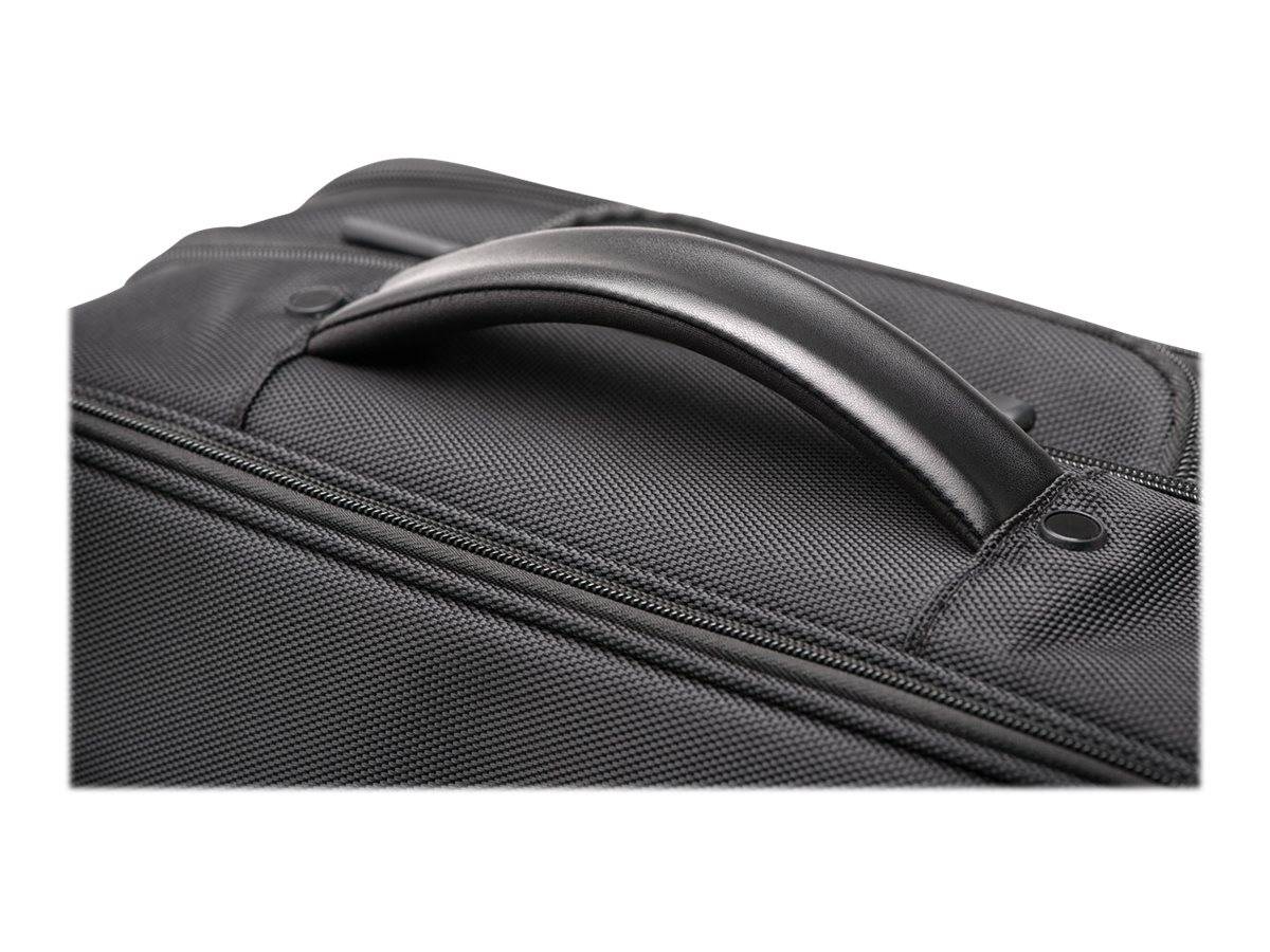 Nahaufnahme einer schwarzen strukturierten Tasche mit geformtem oberen Tragegriff und Reißverschlussnaht, vor einem einfachen weißen Hintergrund gezeigt.