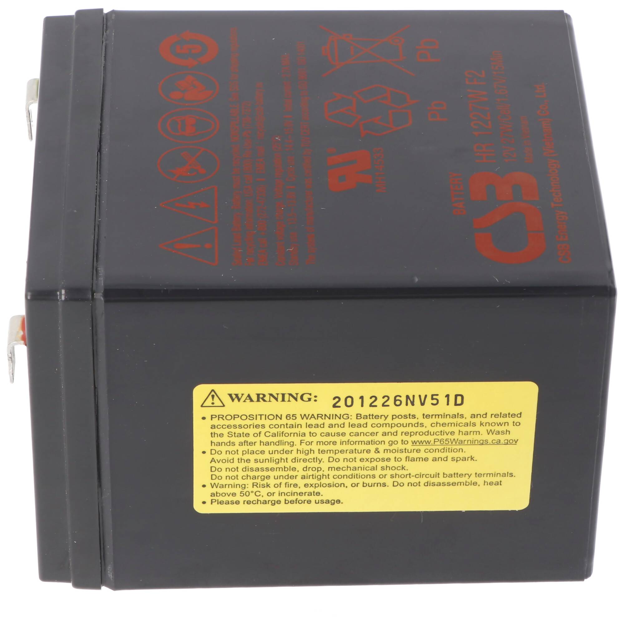 Schwarze aufladbare Batterie mit roten Markierungen und einem gelben Warnschild, in Nahaufnahme auf weißem Hintergrund dargestellt.