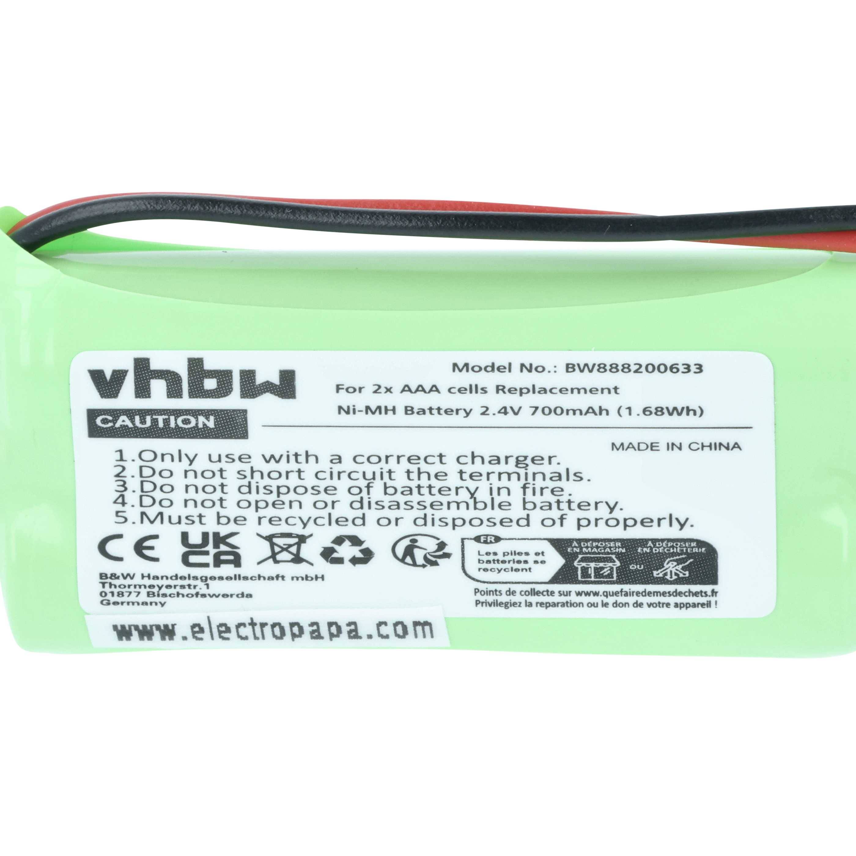 Eine grüne wiederaufladbare Batterie mit zwei Kabeln, gekennzeichnet mit 