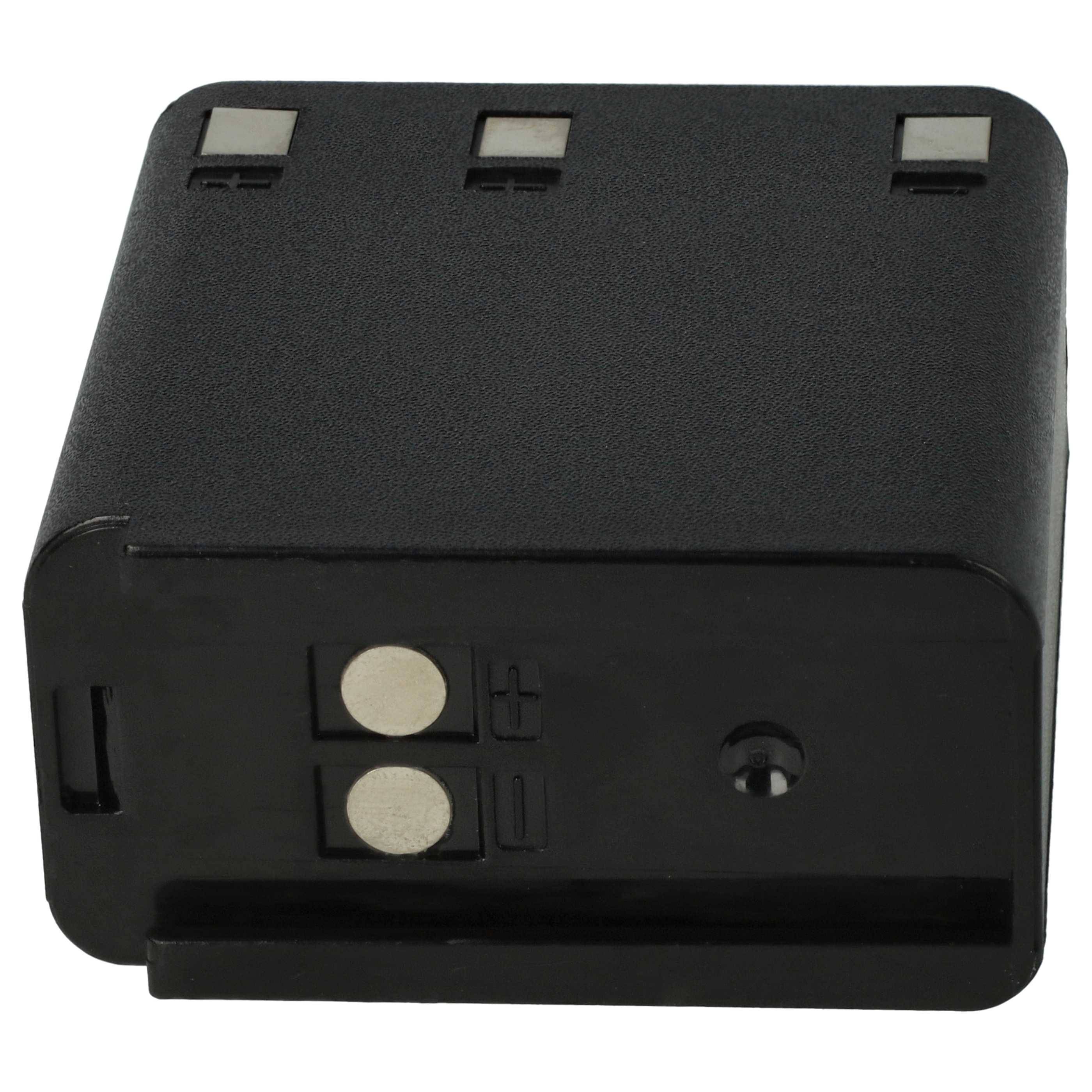 Ein schwarzes rechteckiges Batteriepack mit zwei sichtbaren Anschlüssen und einem Positiv- und Negativsymbol.