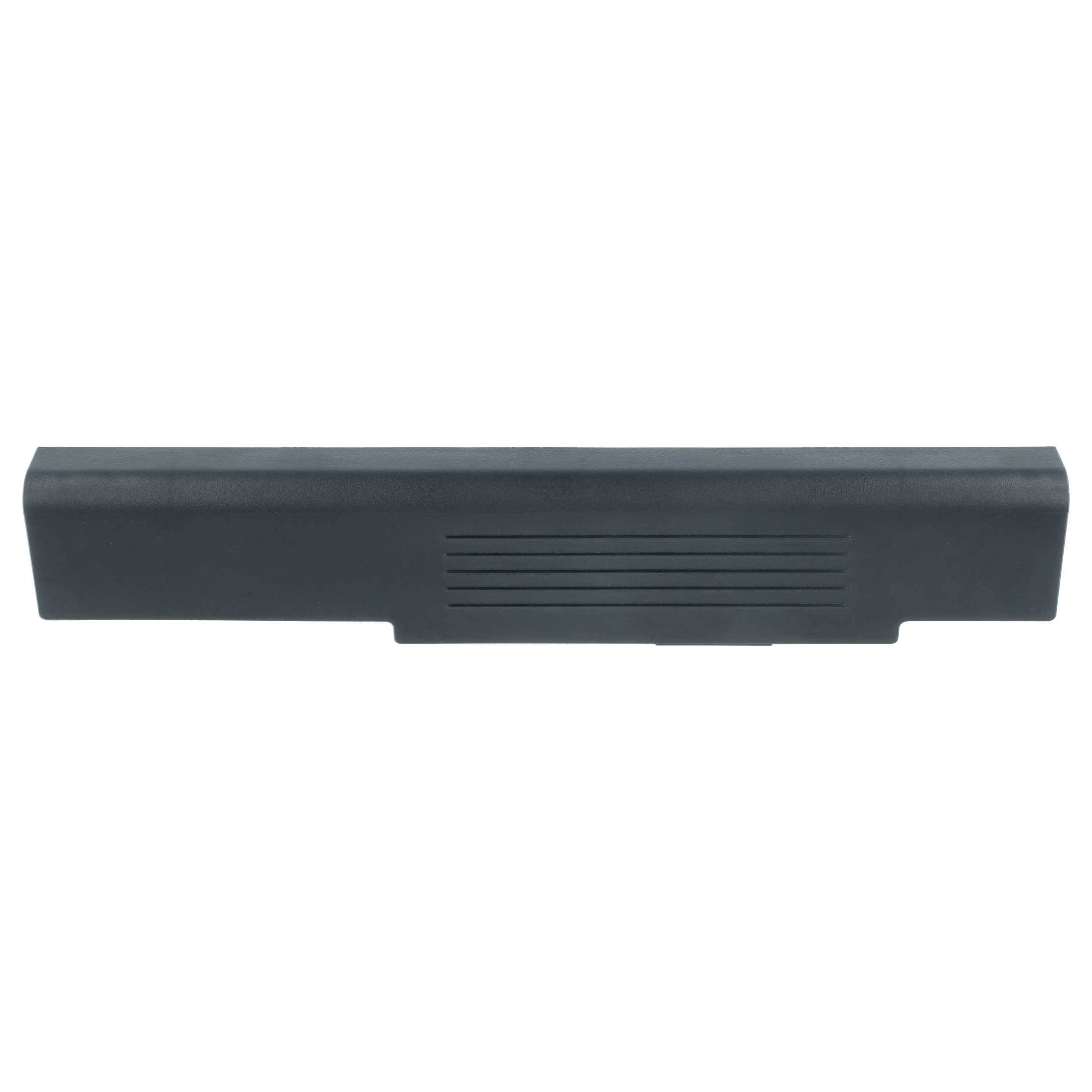 Eine schwarze Laptop-Batterie, rechteckig mit Lüftungslinien auf einer Seite, von oben betrachtet.