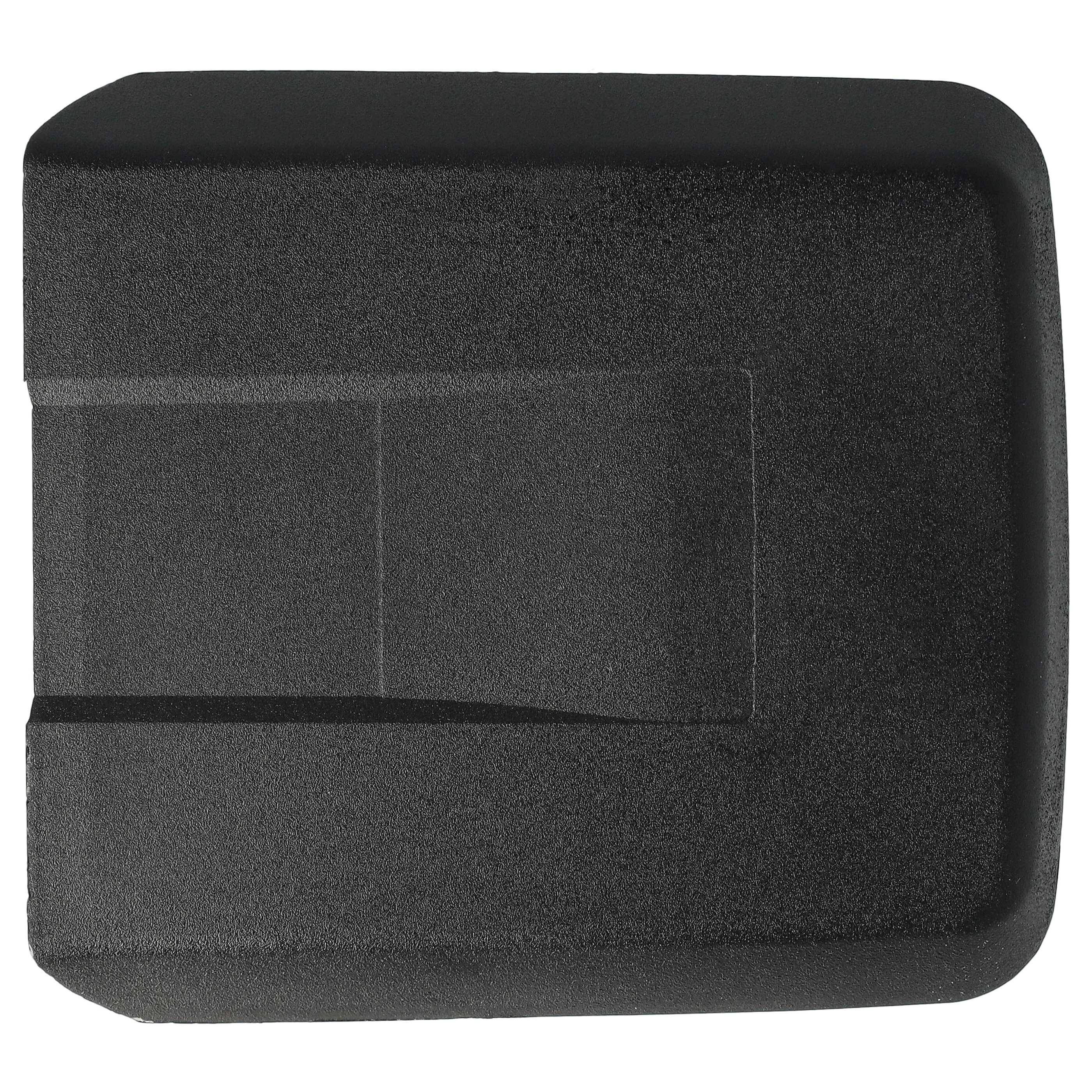 Eine schwarze Kunststoffschutzabdeckung mit einer strukturierten Oberfläche und einer zentralen Aussparung, von oben betrachtet.