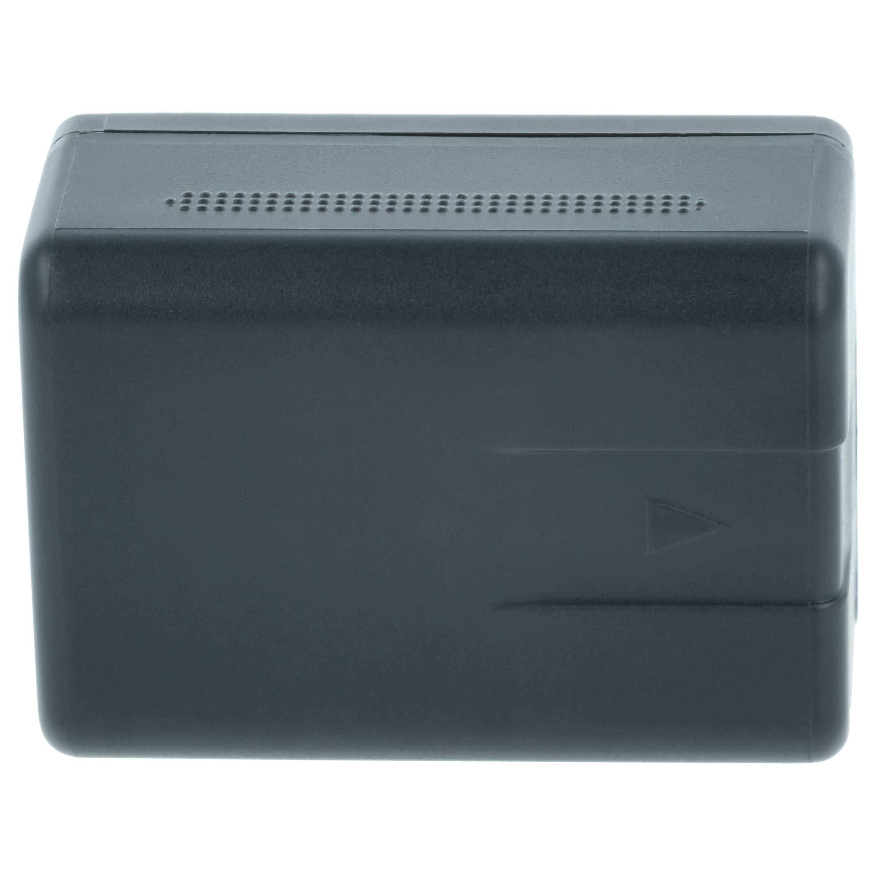 Ein schwarzes rechteckiges Batteriepack mit einem kleinen Pfeil auf der Seite, der die Einführungsrichtung anzeigt.