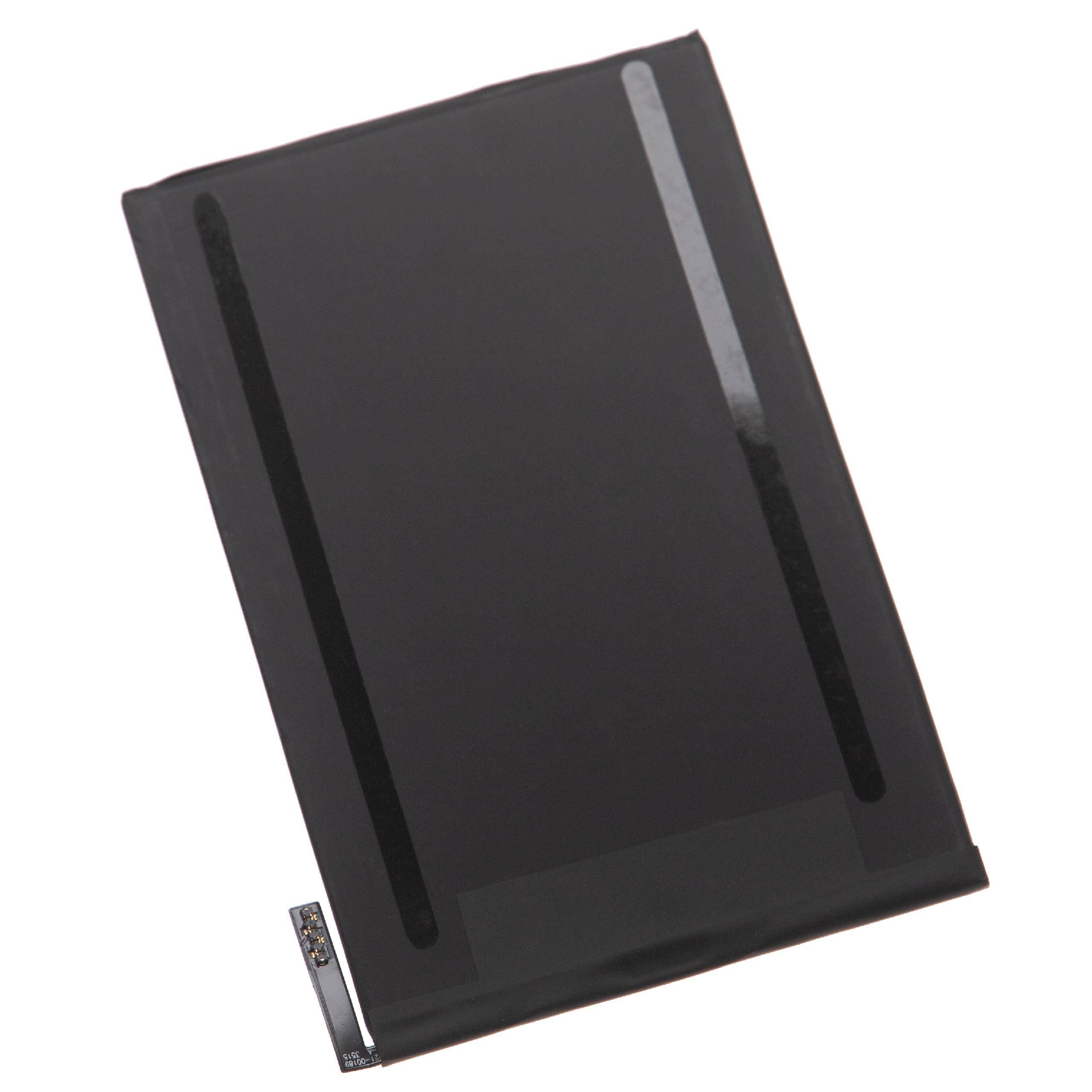 Eine flache, rechteckige schwarze Batterie für ein elektronisches Gerät, die auf einem weißen Hintergrund dargestellt ist.